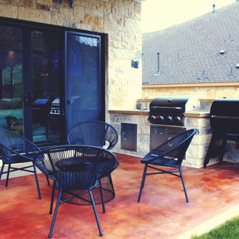Perfect Lawns & Landworks - a patio with chairs and a grill - Landscaping Near Me - Austin, Texas Perfect Lawns & Landworks - a patio with chairs and a grill - Landscaping Near Me - Austin, Texas