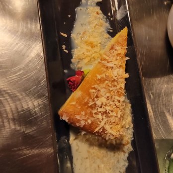 Batuqui On The Falls - Coconut Butter Cake With Creme Anglaise, Whipped Cream and Toasted Coconut - Brazilian Near Me - Chagrin Falls, Ohio