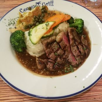 Coconut Grill - NY steak & Mahi Mahi with garlic mash potatoes. Steam vegetables. $20 - American Near Me - Hilo, Hawaii Coconut Grill - NY steak & Mahi Mahi with garlic mash potatoes. Steam vegetables. $20 - American Near Me - Hilo, Hawaii