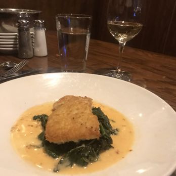 Shaw's Crab House - Halibut with steamed spinach. - Seafood Near Me - Chicago, Illinois Shaw's Crab House - Halibut with steamed spinach. - Seafood Near Me - Chicago, Illinois