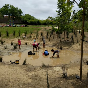 Adventure Playground - Muddy fun. Don't worry, there's a hose to clean them off before going home. - Playgrounds Near Me - Irvine, California