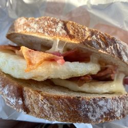 Dunkin' - Sourdough Breakfast Sandwiches are massive. $5 for two full slices of bread, two eggs, cheese, and bacon.