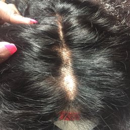 The front of the wig is where she "customized" it, then toward the back the wig was untouched, Absolutely Disgraceful!!!