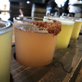 Black Market Brewing Co - Temecula - The one with the stuff on the rim is the Watermelon Sour, a Gose brewed with Himalayan salt. That is salt on the rim. - Breweries Near Me - Temecula, California