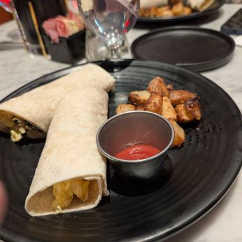Ane Restaurant & Bar - Breakfast wrap and their wonderful potatoes. - Indian Near Me - New York, New York Ane Restaurant & Bar - Breakfast wrap and their wonderful potatoes. - Indian Near Me - New York, New York