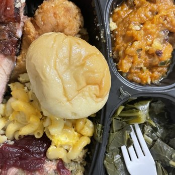 Freds Market - Riverview - To-go plate: fried chicken, greens, sweet potato soufflé, dressing too with gravy and cranberry sauce, and roll. - Southern Near Me - Riverview, Florida