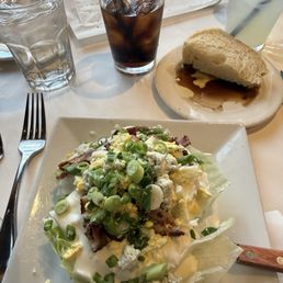 Wedge salad was delicious! Usually just lettuce and to my surprise there was egg too and blue cheese dressing was delicious. Wedge salad was delicious! Usually just lettuce and to my surprise there was egg too and blue cheese dressing was delicious.