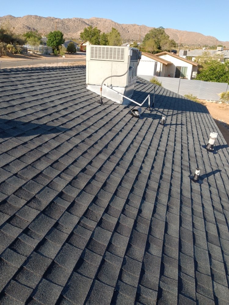 Slide of Moses Roofing