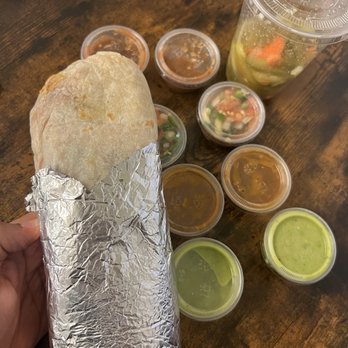 El Castillito - Al pasta y pollo asado burrito with extra meat with all salsas on side - Mexican Near Me - San Francisco, California El Castillito - Al pasta y pollo asado burrito with extra meat with all salsas on side - Mexican Near Me - San Francisco, California