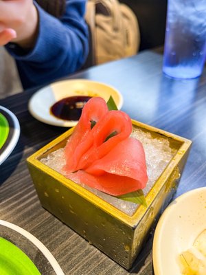 Kura Revolving Sushi Bar by null