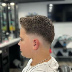 Benny and Bina's Hair Studio - Low skin fade