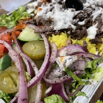 Halal Bros - Lamb Shawarma over Rice.. added onions and pickles - Mediterranean Near Me - Austin, Texas