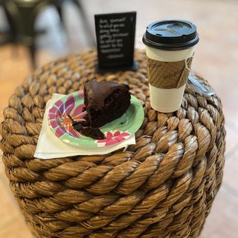 Nuanced Cafe - Chocolate cake, loose leave black tea,and a cute inspirational quote on a cozy two seater in the corner. - Coffee & Tea Near Me - Camden, New Jersey