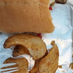 Pier 909 - Cheese steak and curley fries!