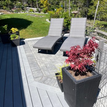 Sub Stone Contracting - two lounge chairs on a deck - Landscaping Near Me Sub Stone Contracting - two lounge chairs on a deck - Landscaping Near Me