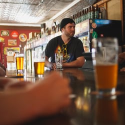 Bridgetown Beerhouse - Sitting at the bar. There's a single tv for sports. Usually Timbers or Blazers games