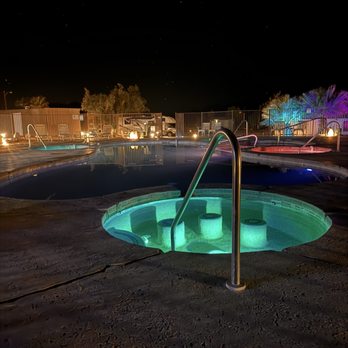 Death Valley Hot Springs - Night time pool and surrounding little pools under the stars. - Hotels Near Me - Tecopa, California Death Valley Hot Springs - Night time pool and surrounding little pools under the stars. - Hotels Near Me - Tecopa, California
