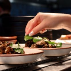 CTZN - Garnishing with Cilantro on the Charred Maitake Mushrooms