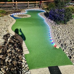 a miniature golf course at night a miniature golf course at night