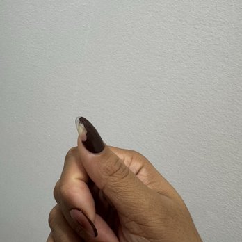 Sunlit - Chipped Nail from a week after being done - Nail Salons Near Me - Brooklyn, New York