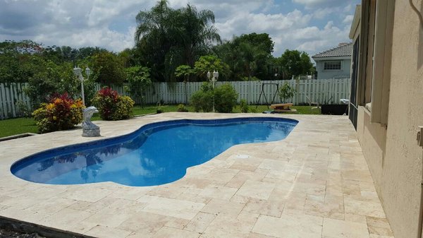 Travertine and Marble Decking & Walkway Solutions - At Bluewater Pools, we specialize in crafting exquisite decks and walkways using the finest Travertine and Marble. Our commitment to quality material is matched by our diverse range of colors and patterns, offering you limitless possibilities to enhance your outdoor space.
Whether you are looking for an elegant overlay, a functional extension, or entirely new decking, our team has the expertise to bring your vision to life.
Our Travertine and Marble Decks and Walkways solutions are not just about looks; they promise durability and longevity, ensuring your outdoor spaces remain beautiful and functional for years.
From selection to installation, we guide you through every step, ensuring your decking and walkways reflect your style and meet your needs. Travertine and Marble Decking & Walkway Solutions - At Bluewater Pools, we specialize in crafting exquisite decks and walkways using the finest Travertine and Marble. Our commitment to quality material is matched by our diverse range of colors and patterns, offering you limitless possibilities to enhance your outdoor space.
Whether you are looking for an elegant overlay, a functional extension, or entirely new decking, our team has the expertise to bring your vision to life.
Our Travertine and Marble Decks and Walkways solutions are not just about looks; they promise durability and longevity, ensuring your outdoor spaces remain beautiful and functional for years.
From selection to installation, we guide you through every step, ensuring your decking and walkways reflect your style and meet your needs.