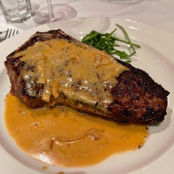 The Capital Grille - Bone-In Kona Crusted Dry Aged NY Strip - Steakhouses Near Me - Plano, Texas The Capital Grille - Bone-In Kona Crusted Dry Aged NY Strip - Steakhouses Near Me - Plano, Texas