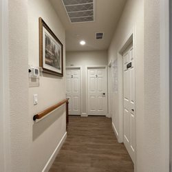 DLC Elderly - Wide spacious Hallway with professionally numbered and labeled rooms for easy identification.  Bright motion sensor night lights too!