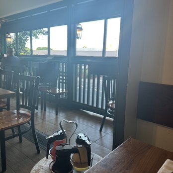 Eggs 'n Things - View from the inside to the balcony area. Also the coconut, guava and regular syrup for the delicious pancakes. - Breakfast & Brunch Near Me - Honolulu, Hawaii Eggs 'n Things - View from the inside to the balcony area. Also the coconut, guava and regular syrup for the delicious pancakes. - Breakfast & Brunch Near Me - Honolulu, Hawaii
