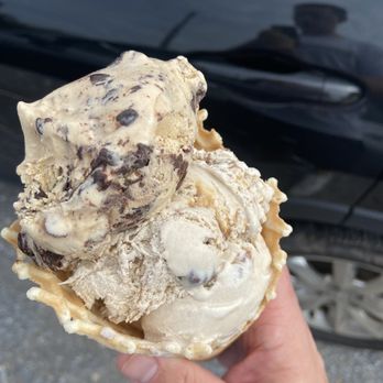 Blue Mountain Beach Creamery - Bourbon toffee on top, cappuccino chocolate chunk on bottom, all nestled in a homemade waffle cone - Ice Cream & Frozen Yogurt Near Me - Santa Rosa Beach, Florida Blue Mountain Beach Creamery - Bourbon toffee on top, cappuccino chocolate chunk on bottom, all nestled in a homemade waffle cone - Ice Cream & Frozen Yogurt Near Me - Santa Rosa Beach, Florida