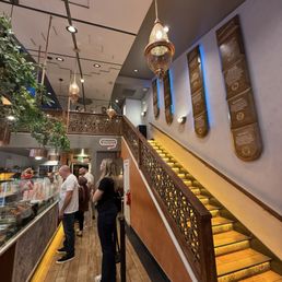 Ordering space and the stairs leading to seating upstairs.