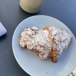 Almond croissant, vanilla latte Almond croissant, vanilla latte