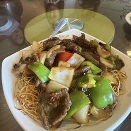 Crispy Hong Kong. style chow mein with beef & black bean sauce. Crispy Hong Kong. style chow mein with beef & black bean sauce.