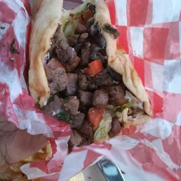 Small diced pieces of lamb that continually rolled out of my pita. Small diced pieces of lamb that continually rolled out of my pita.