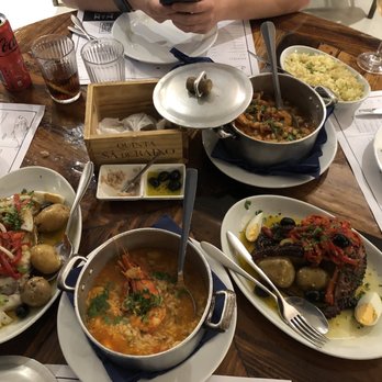 Meia-Nau - Left to right - codfish; seafood rice; squid grilled; bean stew with shrimp and squid - Seafood Near Me - Matosinhos, 13 Meia-Nau - Left to right - codfish; seafood rice; squid grilled; bean stew with shrimp and squid - Seafood Near Me - Matosinhos, 13