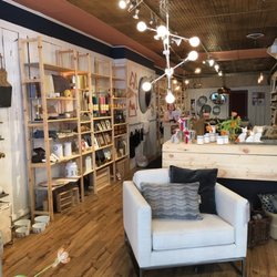 Redwood & Co - Love the wooden shelving display.