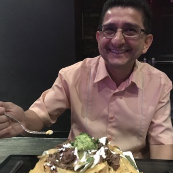 Irvine Improv - Check out those nachos with guac and carnitas a lot for one person!! - Comedy Clubs Near Me - Irvine, California Irvine Improv - Check out those nachos with guac and carnitas a lot for one person!! - Comedy Clubs Near Me - Irvine, California