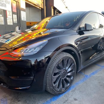 Premier Collision Center - After (before they replaced the front driver side tire and rim) - Body Shops Near Me - Northridge, California Premier Collision Center - After (before they replaced the front driver side tire and rim) - Body Shops Near Me - Northridge, California
