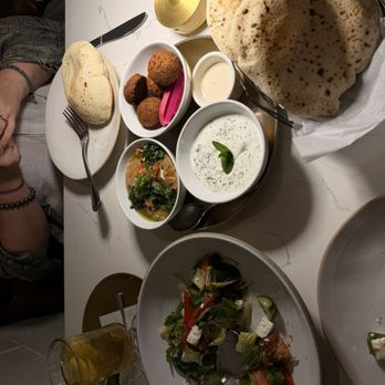Ammatoli - Falafel Mezza, Cucumber & Yogurt Mezza, Foul Mudammas Mezza, fresh pita, Greek Salad - Mediterranean Near Me - Long Beach, California Ammatoli - Falafel Mezza, Cucumber & Yogurt Mezza, Foul Mudammas Mezza, fresh pita, Greek Salad - Mediterranean Near Me - Long Beach, California
