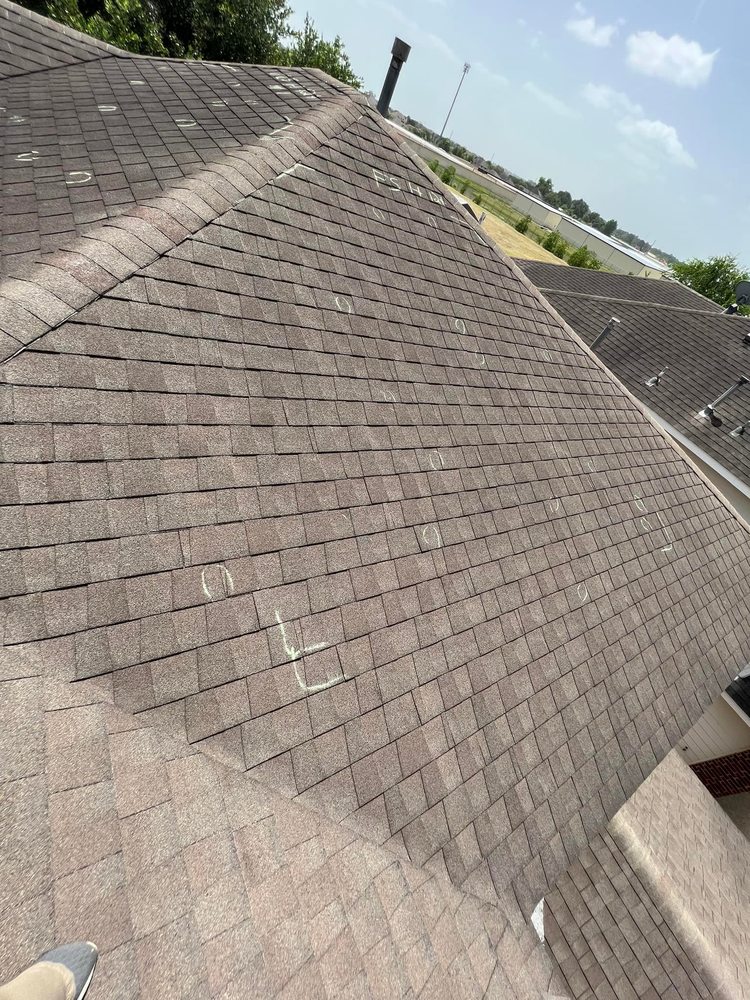 Slide of Hauk Roofing