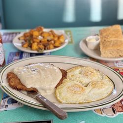 Nancy May's 50's Cafe - Accident #1: Chicken Fried Steak, Gravy & 3 Eggs. Comes with two sides