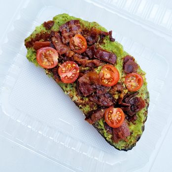 KIT Coffee - Smoked Avocado Toast - smashed avocado on italian country toast, bacon, smoked paprika, cherry tomatoes, lemon zest & chives - Coffee & Tea Near Me - Irvine, California KIT Coffee - Smoked Avocado Toast - smashed avocado on italian country toast, bacon, smoked paprika, cherry tomatoes, lemon zest & chives - Coffee & Tea Near Me - Irvine, California