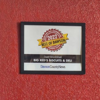 Big Red’s Biscuits & Deli - a sign on a red wall - Delis Near Me - Dawsonville, Georgia Big Red’s Biscuits & Deli - a sign on a red wall - Delis Near Me - Dawsonville, Georgia