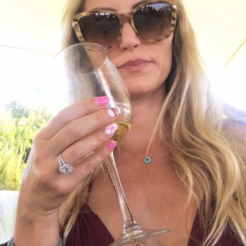 Fantasy Beauty And Spas - Wine glass holding nails - Nail Salons Near Me - Hermosa Beach, California Fantasy Beauty And Spas - Wine glass holding nails - Nail Salons Near Me - Hermosa Beach, California