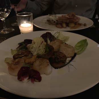 Fork - Scallops dish and pork belly in the back - New American Near Me - Philadelphia, Pennsylvania Fork - Scallops dish and pork belly in the back - New American Near Me - Philadelphia, Pennsylvania