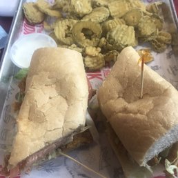 Catfish poboy w/ fried pickles Catfish poboy w/ fried pickles