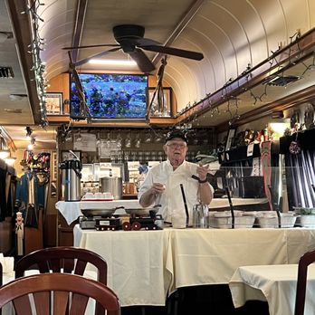 Bob's Train - Bob telling stories as he cooks up deliciousness - New American Near Me - Sarasota, Florida