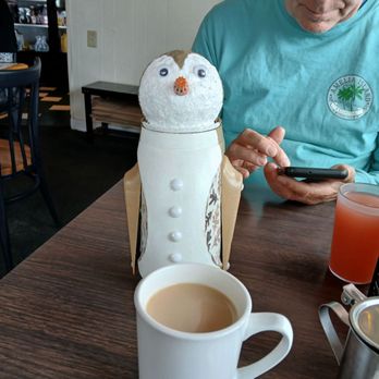 Alouette Beach Cafe - Penguin enjoys a hot cup of coffee - Breakfast & Brunch Near Me - Old Orchard Beach, Maine