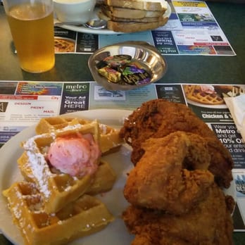 Metro Diner - Half of fried chicken and a Belgian waffle topped with sweet strawberry butter and served with their sweet and spicy sauce. - Diners Near Me - Gainesville, Florida Metro Diner - Half of fried chicken and a Belgian waffle topped with sweet strawberry butter and served with their sweet and spicy sauce. - Diners Near Me - Gainesville, Florida