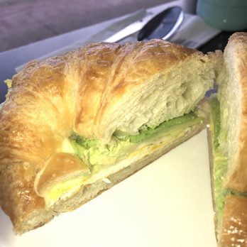 O'side Bakery - Egg and cheese with avocado on a croissant - Breakfast & Brunch Near Me - Oceanside, California O'side Bakery - Egg and cheese with avocado on a croissant - Breakfast & Brunch Near Me - Oceanside, California