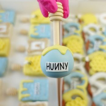 Treats By Jess - Hunny Winnie the Pooh Round Cake Pops with honey sticks - Desserts Near Me Treats By Jess - Hunny Winnie the Pooh Round Cake Pops with honey sticks - Desserts Near Me